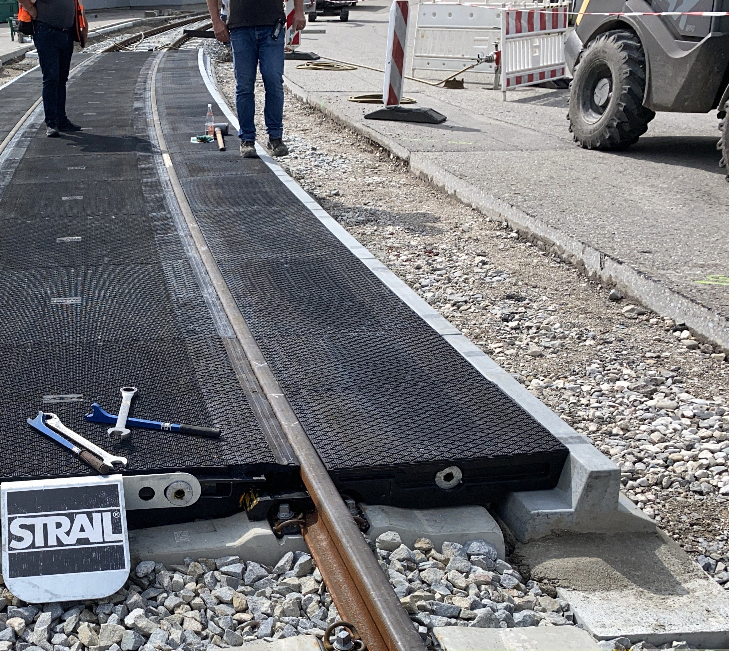 T kerbstone - installed as part of a level crossing