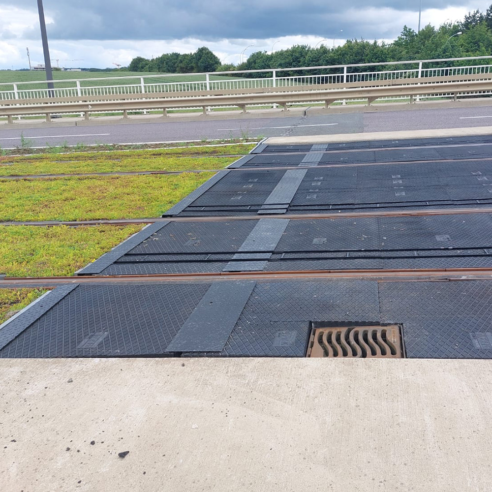 Level crossing panels for emergency access on bridge